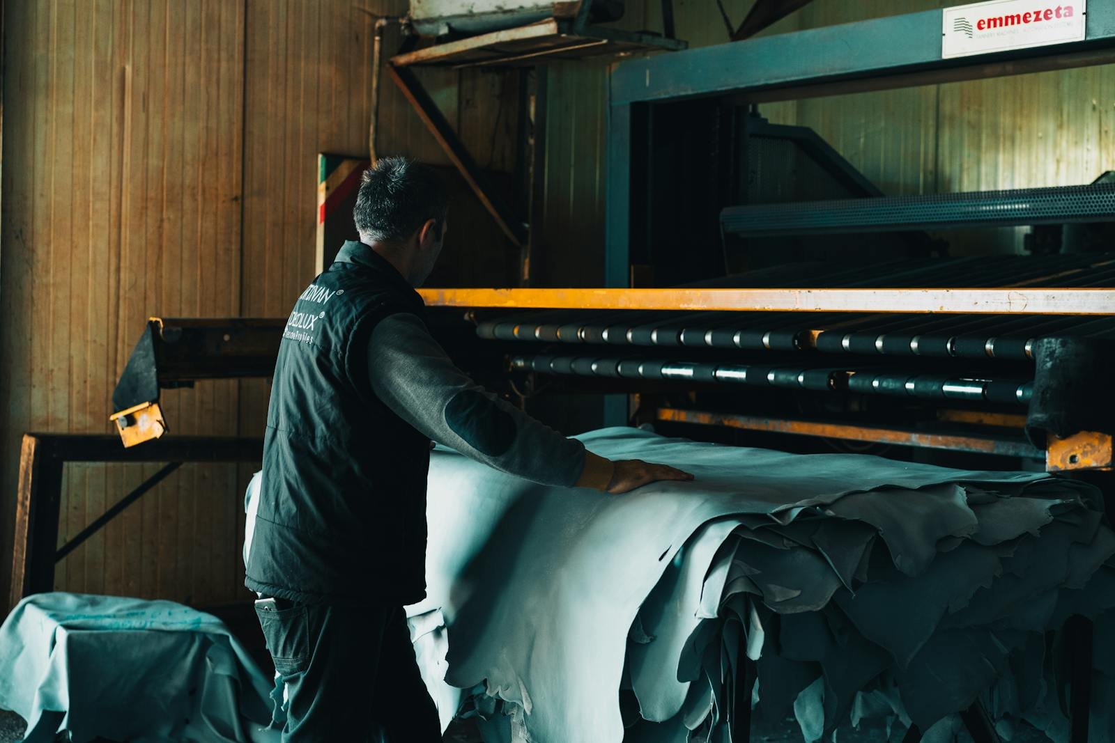 Leathercraft worker processing hides in Gerede tannery, T&uuml;rkiye.