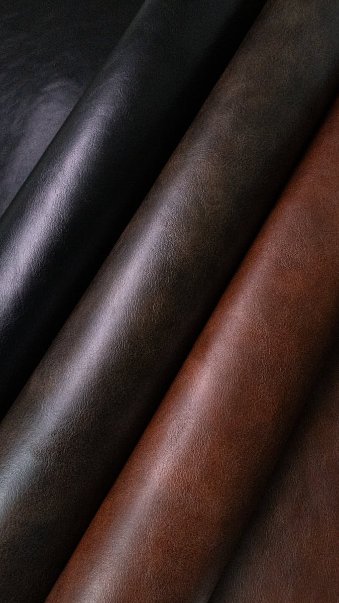 High-quality leather rolls showcasing rich textures and shades, captured in Le&oacute;n, Guanajuato.